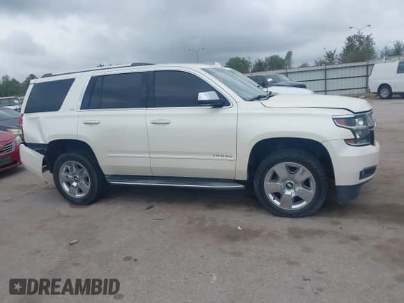 ✅ 2015 Chevrolet Tahoe LTZ • VIN: 1GNSCCKC2FR552510 • Lot: 43736217. Listed on IAAI with 207,190 mi. Free auction sales archive from the USA and detailed vehicle history report at DreamBid. Image 13.