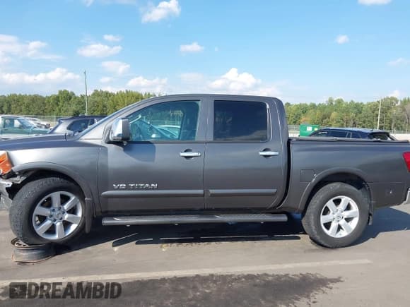 ✅ 2009 Nissan Titan SE • VIN: 1N6AA07D89N300831 • Lot: 43298798. Wystawiony na IAAI z przebiegiem 256 288 mil. Bezpłatny archiwum sprzedaży aukcyjnych z USA i szczegółowy raport historii pojazdu na DreamBid. Zdjęcie 14.