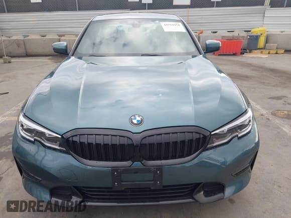 ✅ 2021 BMW 3 Series 330i • VIN: 3MW5R1J06M8B58481 • Lot: 43752256. Listed on IAAI with 15,446 mi. Free auction sales archive from the USA and detailed vehicle history report at DreamBid. Image 12.