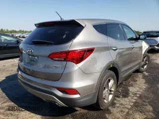 ✅ 2018 Hyundai Santa Fe 2.4L • VIN: 5XYZT3LB3JG538507 • Лот: 57455642. Опубликован ранее на Copart с пробегом 93 463 миль. Бесплатный доступ к архиву аукционных продаж из США и подробный отчёт об истории автомобиля на DreamBid. Изображение 4.