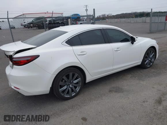 ✅ 2021 Mazda 6 Grand Touring • VIN: JM1GL1TY1M1616447 • Lot: 43737508. Listed on IAAI with 31,293 mi. Free auction sales archive from the USA and detailed vehicle history report at DreamBid. Image 4.