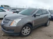 ✅ 2011 Cadillac SRX Luxury Collection • VIN: 3GYFNAEY3BS536544 • Lot: 42907898. Listed on IAAI with 275,518 mi. Free auction sales archive from the USA and detailed vehicle history report at DreamBid. Image 2.