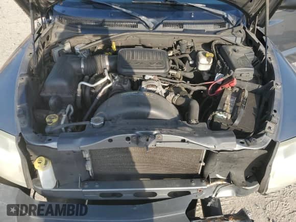 2006 Dodge Dakota ST z VIN 1D7HE28K36S595242, wystawiony jako Copart lot #51348695 z przebiegiem 110 602 mil mil oraz Szkoda całkowita • Salvage title. Historia ofert i sprzedaży dostępna na DreamBid. Obrazek 12.