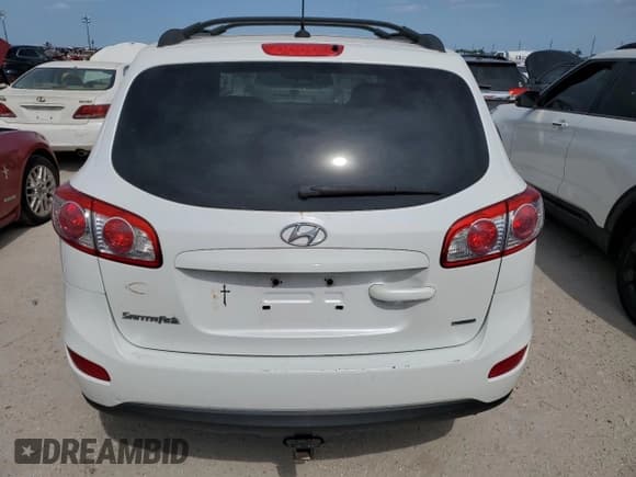 ✅ 2012 Hyundai Santa Fe GLS • VIN: 5XYZGDAB7CG097500 • Lot: 76201154. Listed on Copart with 51,100 mi. Free auction sales archive from the USA and detailed vehicle history report at DreamBid. Image 6.