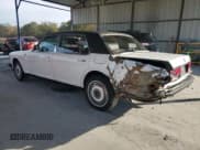 ✅ 1987 Rolls-Royce Silver Spur • VIN: SCAZN02A7HCX21836 • Лот: 82896744. Опубликован ранее на Copart с пробегом 102 544 миль. Бесплатный доступ к архиву аукционных продаж из США и подробный отчёт об истории автомобиля на DreamBid. Изображение 2.