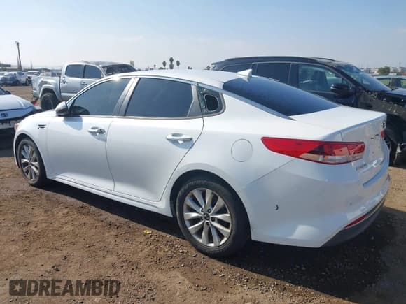 ✅ 2018 Kia Optima LX • VIN: 5XXGT4L35JG265399 • Lot: 43785035. Listed on IAAI with 128,699 mi. Free auction sales archive from the USA and detailed vehicle history report at DreamBid. Image 3.