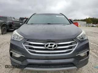 2018 Hyundai Santa Fe 2.4L z VIN 5XYZU3LB7JG543240, wystawiony jako Copart lot #89693095 z przebiegiem 121 636 mil mil oraz Czysty tytuł • Clean title. Historia ofert i sprzedaży dostępna na DreamBid. Obrazek 5.