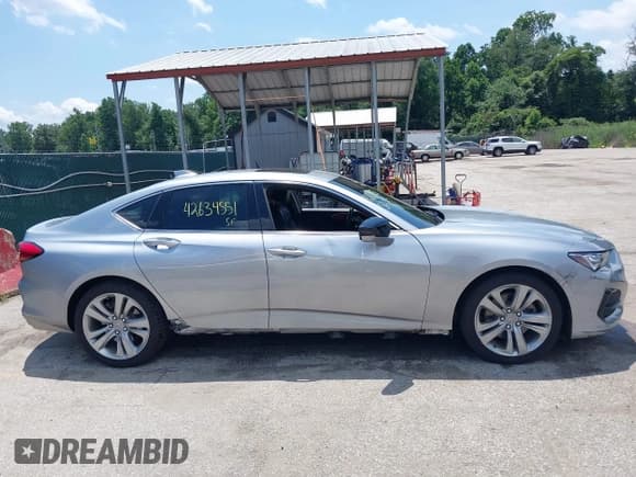 ✅ 2021 Acura TLX Technology • VIN: 19UUB6F41MA008781 • Лот: 42634551. Опубликован ранее на IAAI с пробегом 62 303 миль. Бесплатный доступ к архиву аукционных продаж из США и подробный отчёт об истории автомобиля на DreamBid. Изображение 14.