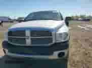 2007 Dodge 1500 ST z VIN 1D7HA18K97J583500, wystawiony jako Copart lot #84458264 z przebiegiem 156 636 mil mil oraz Szkoda całkowita • Salvage title. Historia ofert i sprzedaży dostępna na DreamBid. Obrazek 11.
