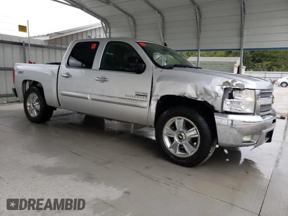 ✅ 2012 Chevrolet Silverado 1500 LT • VIN: 3GCPKSE72CG240645 • Lot: 71464474. Listed on Copart with 176,694 mi. Free auction sales archive from the USA and detailed vehicle history report at DreamBid. Image 4.