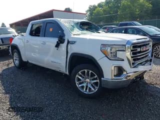 ✅ 2021 GMC Sierra 1500 SLT • VIN: 3GTU9DEDXMG250292 • Lot: 42810312. Listed on IAAI with 39,931 mi. Free auction sales archive from the USA and detailed vehicle history report at DreamBid. Image 1.