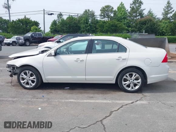 ✅ 2012 Ford Fusion SE • VIN: 3FAHP0HG7CR368279 • Lot: 42288523. Listed on IAAI with 176,808 mi. Free auction sales archive from the USA and detailed vehicle history report at DreamBid. Image 14.
