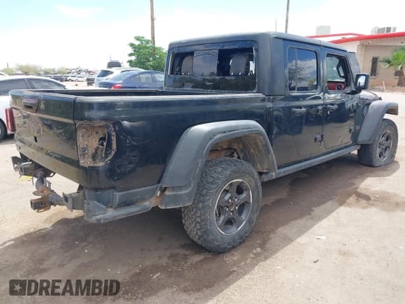 ✅ 2022 Jeep Gladiator Rubicon • VIN: 1C6JJTBM3NL165377 • Lot: 42020584. Listed on IAAI with 87,433 mi. Free auction sales archive from the USA and detailed vehicle history report at DreamBid. Image 4.