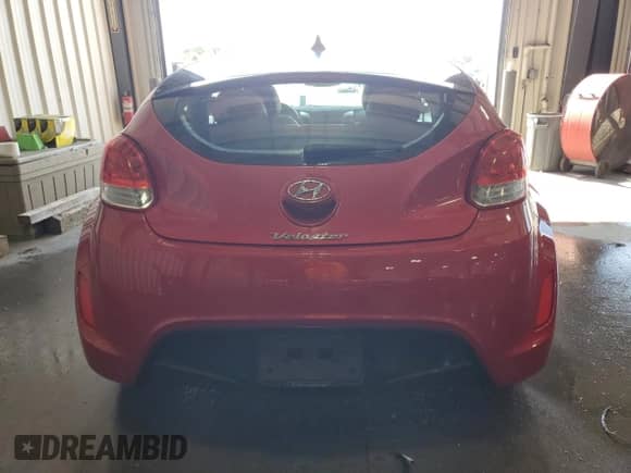 2013 Hyundai Veloster w/Gray Int с VIN KMHTC6AD9DU171140, выставлен на аукционе Copart как лот 71299174 с пробегом 100 755 миль миль и Списание • Salvage title. История ставок и продаж доступна на DreamBid. Изображение 6.