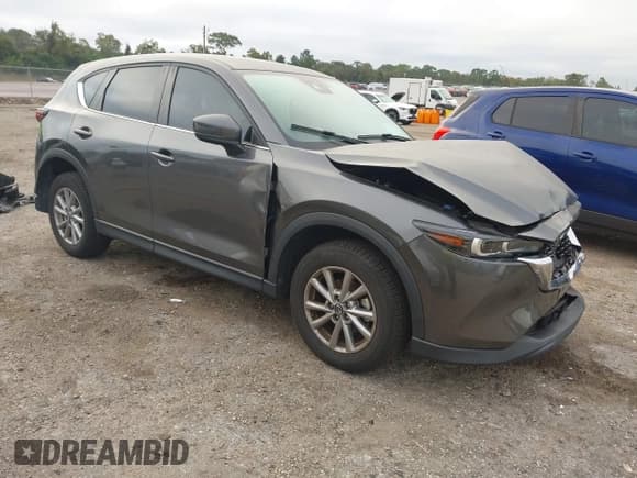 ✅ 2023 Mazda CX-5 S Preferred • VIN: JM3KFBCM3P0230215 • Lot: 43568007. Listed on IAAI with 42,607 mi. Free auction sales archive from the USA and detailed vehicle history report at DreamBid. Image 1.