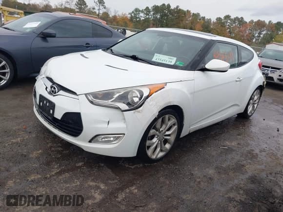 ✅ 2013 Hyundai Veloster w/Black Int • VIN: KMHTC6AD9DU145590 • Lot: 43545139. Wystawiony na IAAI z przebiegiem 155 729 mil. Bezpłatny archiwum sprzedaży aukcyjnych z USA i szczegółowy raport historii pojazdu na DreamBid. Zdjęcie 2.