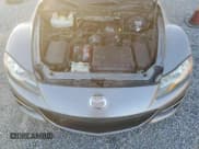 ✅ 2009 Mazda RX-8 Grand Touring • VIN: JM1FE17M990403160 • Lot: 86778244. Wystawiony na Copart z przebiegiem 115 207 mil. Bezpłatny archiwum sprzedaży aukcyjnych z USA i szczegółowy raport historii pojazdu na DreamBid. Zdjęcie 11.