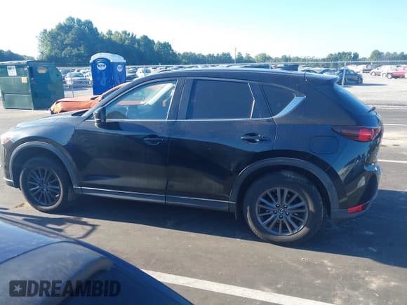 ✅ 2019 Mazda CX-5 Sport • VIN: JM3KFABMXK1552901 • Lot: 43104258. Listed on IAAI with 104,368 mi. Free auction sales archive from the USA and detailed vehicle history report at DreamBid. Image 13.