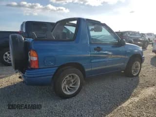 ✅ 2001 Suzuki Vitara JLS • VIN: 2S3TC52C116101163 • Lot: 74469744. Wystawiony na Copart z przebiegiem Nie podano. Bezpłatny archiwum sprzedaży aukcyjnych z USA i szczegółowy raport historii pojazdu na DreamBid. Zdjęcie 3.