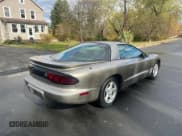 ✅ 1999 Pontiac Firebird Firebird • VIN: 2G2FS22K9X2215744 • Lot: 89608335. Listed on Copart with 201,690 mi. Free auction sales archive from the USA and detailed vehicle history report at DreamBid. Image 4.