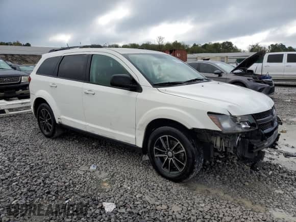 2017 Dodge Journey SE with VIN 3C4PDCAB8HT622011, listed as a Copart auction lot 85518895 with 121,368 mi miles and Salvage title. Bid and sale history available at DreamBid. Image 4.