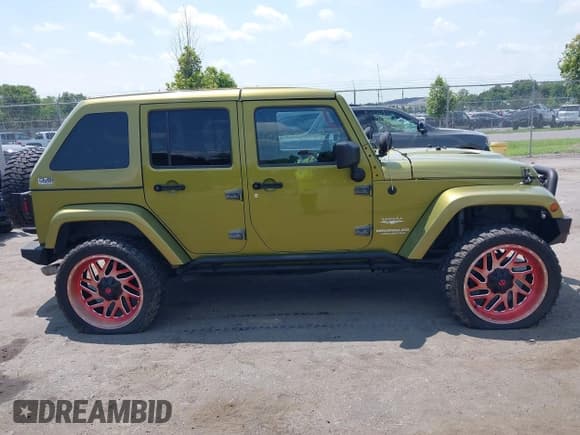 ✅ 2007 Jeep Wrangler Unlimited Sahara • VIN: 1J4GA59117L118162 • Lot: 42835652. Listed on IAAI with 199,208 mi. Free auction sales archive from the USA and detailed vehicle history report at DreamBid. Image 13.