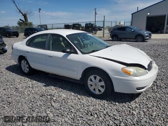 ✅ 2006 Ford Taurus SE • VIN: 1FAFP53256A125309 • Lot: 80096585. Listed on Copart with 243,463 mi. Free auction sales archive from the USA and detailed vehicle history report at DreamBid. Image 4.