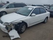 ✅ 2002 Kia Spectra • VIN: KNAFB121725173856 • Лот: 42609686. Опубликован ранее на IAAI с пробегом 160 894 миль. Бесплатный доступ к архиву аукционных продаж из США и подробный отчёт об истории автомобиля на DreamBid. Изображение 2.