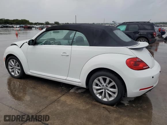 ✅ 2014 Volkswagen Beetle 2.0L TDI • VIN: 3VW5L7AT9EM823171 • Lot: 69486244. Listed on Copart with 65,557 mi. Free auction sales archive from the USA and detailed vehicle history report at DreamBid. Image 2.