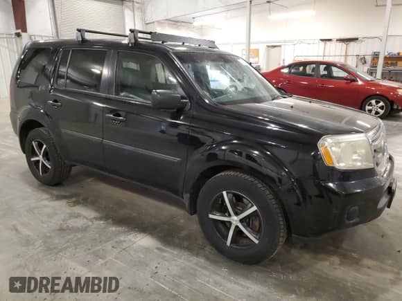 2010 Honda Pilot LX with VIN 5FNYF4H26AB031724, listed as a Copart auction lot 64199905 with 205,743 mi miles and Salvage title. Bid and sale history available at DreamBid. Image 4.