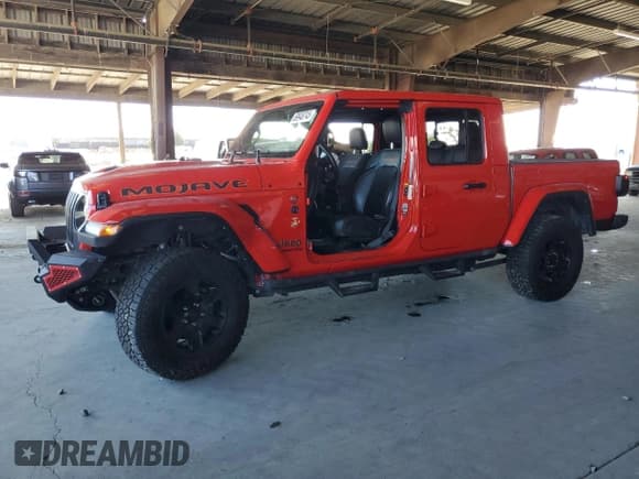 ✅ 2022 Jeep Gladiator Mojave • VIN: 1C6JJTEG9NL164076 • Lot: 69948745. Listed on Copart with 13,722 mi. Free auction sales archive from the USA and detailed vehicle history report at DreamBid. Image 1.