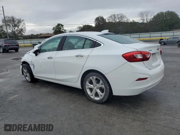 ✅ 2017 Chevrolet Cruze Premier • VIN: 1G1BF5SMXH7106424 • Lot: 90459715. Listed on Copart with 83,302 mi. Free auction sales archive from the USA and detailed vehicle history report at DreamBid. Image 2.
