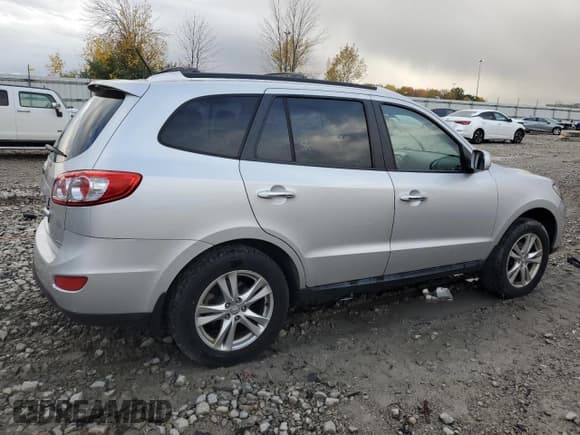 ✅ 2012 Hyundai Santa Fe Limited • VIN: 5XYZK3AB3CG156227 • Lot: 75824564. Listed on Copart with 149,767 mi. Free auction sales archive from the USA and detailed vehicle history report at DreamBid. Image 3.