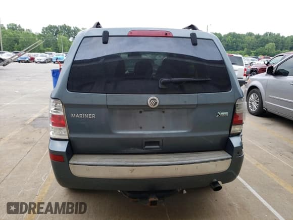 ✅ 2010 Mercury Mariner • VIN: 4M2CN9BG6AKJ17322 • Lot: 61141115. Listed on Copart with 296,537 mi. Free auction sales archive from the USA and detailed vehicle history report at DreamBid. Image 6.