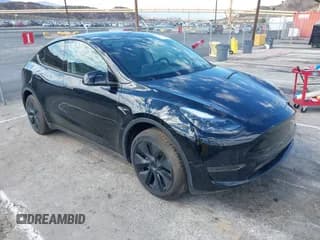 ✅ 2025 Tesla Model Y Long Range • VIN: 7SAYGDEDXSF282401 • Лот: 43241825. Опубликован ранее на IAAI с пробегом 76 миль. Бесплатный доступ к архиву аукционных продаж из США и подробный отчёт об истории автомобиля на DreamBid. Изображение 1.