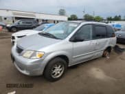 ✅ 2001 Mazda MPV DX • VIN: JM3LW28GX10204760 • Lot: 65154805. Listed on Copart with 140,835 mi. Free auction sales archive from the USA and detailed vehicle history report at DreamBid. Image 1.