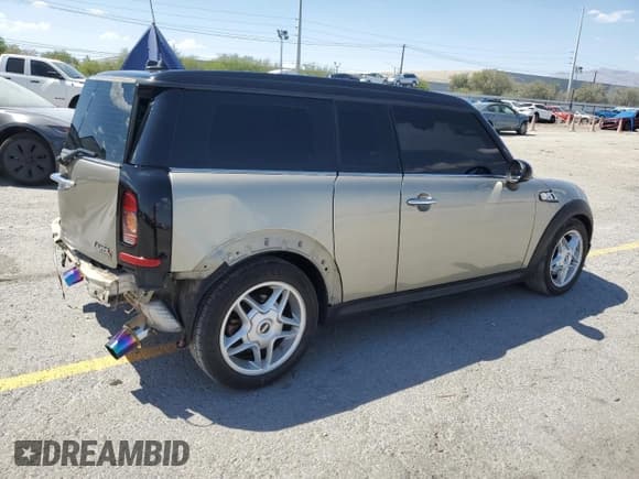 ✅ 2009 MINI Clubman S • VIN: WMWMM335X9TP93573 • Лот: 69290125. Опубликован ранее на Copart с пробегом 107 434 миль. Бесплатный доступ к архиву аукционных продаж из США и подробный отчёт об истории автомобиля на DreamBid. Изображение 3.
