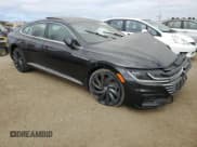 ✅ 2020 Volkswagen Arteon SEL Premium R-Line • VIN: WVWTR7AN3LE018201 • Лот: 71627134. Опубликован ранее на Copart с пробегом 15 637 миль. Бесплатный доступ к архиву аукционных продаж из США и подробный отчёт об истории автомобиля на DreamBid. Изображение 4.