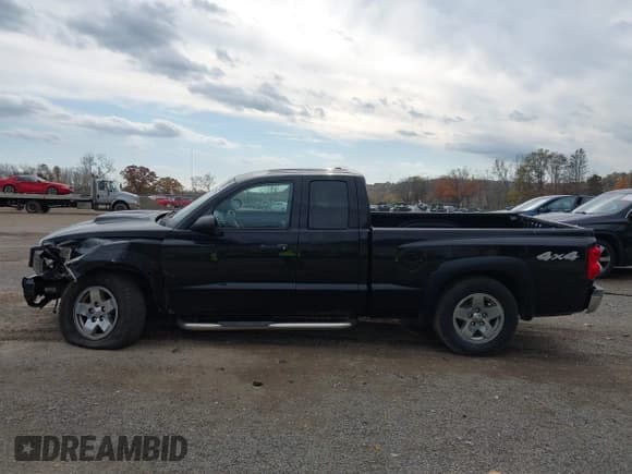 ✅ 2006 Dodge Dakota SLT • VIN: 1D7HW42N36S547476 • Lot: 43603516. Wystawiony na IAAI z przebiegiem 100 434 mil. Bezpłatny archiwum sprzedaży aukcyjnych z USA i szczegółowy raport historii pojazdu na DreamBid. Zdjęcie 15.
