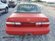 ✅ 1997 Toyota Corolla DX • VIN: 1NXBB02EXVZ521220 • Лот: 83789835. Опубликован ранее на Copart с пробегом 210 571 миль. Бесплатный доступ к архиву аукционных продаж из США и подробный отчёт об истории автомобиля на DreamBid. Изображение 6.