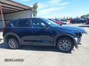 ✅ 2023 Mazda CX-5 S Carbon Edition • VIN: JM3KFBCMXP0282649 • Lot: 42784337. Listed on IAAI with 25,589 mi. Free auction sales archive from the USA and detailed vehicle history report at DreamBid. Image 14.