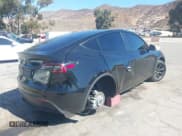 ✅ 2025 Tesla Model Y Long Range • VIN: 7SAYGDED5SF248415 • Лот: 43464829. Опубликован ранее на IAAI с пробегом 18 306 миль. Бесплатный доступ к архиву аукционных продаж из США и подробный отчёт об истории автомобиля на DreamBid. Изображение 4.