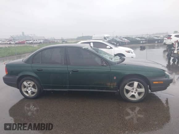 1998 Saturn SL с VIN 1G8ZF5283WZ317646, выставлен на аукционе IAAI как лот 42325214 с пробегом 151 658 миль миль и . История ставок и продаж доступна на DreamBid. Изображение 13.