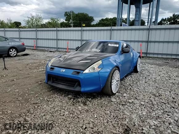 ✅ 2009 Nissan 370Z Touring • VIN: JN1AZ44E59M402418 • Лот: 70516915. Опубликован ранее на Copart с пробегом 108 136 миль. Бесплатный доступ к архиву аукционных продаж из США и подробный отчёт об истории автомобиля на DreamBid. Изображение 13.