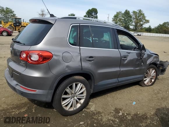 ✅ 2011 Volkswagen Tiguan S • VIN: WVGBV7AX0BW516062 • Lot: 84602025. Listed on Copart with 68,613 mi. Free auction sales archive from the USA and detailed vehicle history report at DreamBid. Image 3.