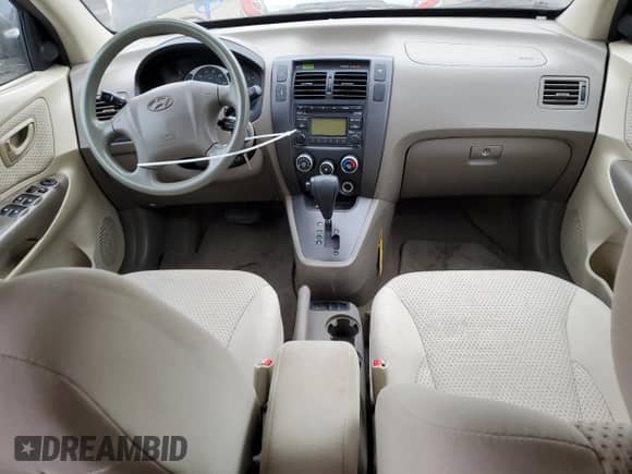 2009 Hyundai Tucson GLS z VIN KM8JM12B79U042549, wystawiony jako Copart lot #87487604 z przebiegiem 112 724 mil mil oraz Szkoda całkowita • Salvage title. Historia ofert i sprzedaży dostępna na DreamBid. Obrazek 8.