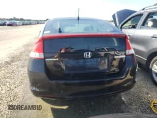 ✅ 2010 Honda Insight EX • VIN: JHMZE2H7XAS009962 • Лот: 73825084. Опубликован ранее на Copart с пробегом 120 513 миль. Бесплатный доступ к архиву аукционных продаж из США и подробный отчёт об истории автомобиля на DreamBid. Изображение 6.