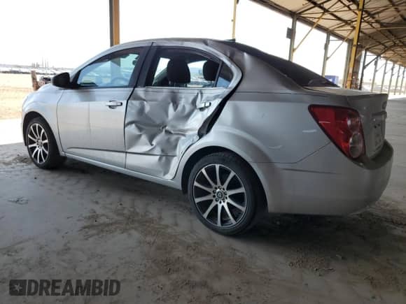 2014 Chevrolet Sonic LS с VIN 1G1JA5SH5E4146369, выставлен на аукционе Copart как лот 63828574 с пробегом 162 188 миль миль и Списание • Salvage title. История ставок и продаж доступна на DreamBid. Изображение 2.