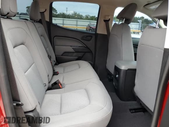 ✅ 2021 Chevrolet Colorado 2WD Work Truck • VIN: 1GCGSBEA3M1211733 • Лот: 71745054. Опубликован ранее на Copart с пробегом 27 244 миль. Бесплатный доступ к архиву аукционных продаж из США и подробный отчёт об истории автомобиля на DreamBid. Изображение 10.