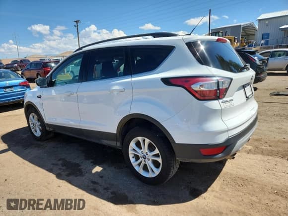 ✅ 2018 Ford Escape SE • VIN: 1FMCU9GD1JUB01911 • Lot: 80621525. Wystawiony na Copart z przebiegiem 91 262 mil. Bezpłatny archiwum sprzedaży aukcyjnych z USA i szczegółowy raport historii pojazdu na DreamBid. Zdjęcie 2.
